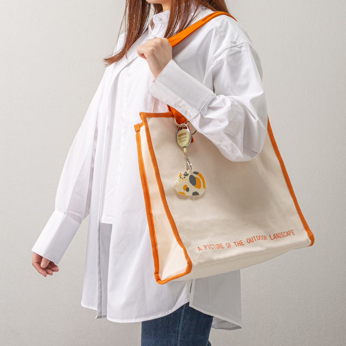 バックにキーホルダー感覚に付けられるにゃんとも楽々オープナー